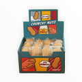 Southern Charm Collectibles Toysmith Crunchy Nutz peanut-shaped fidget toys in a comic-style retail display box
