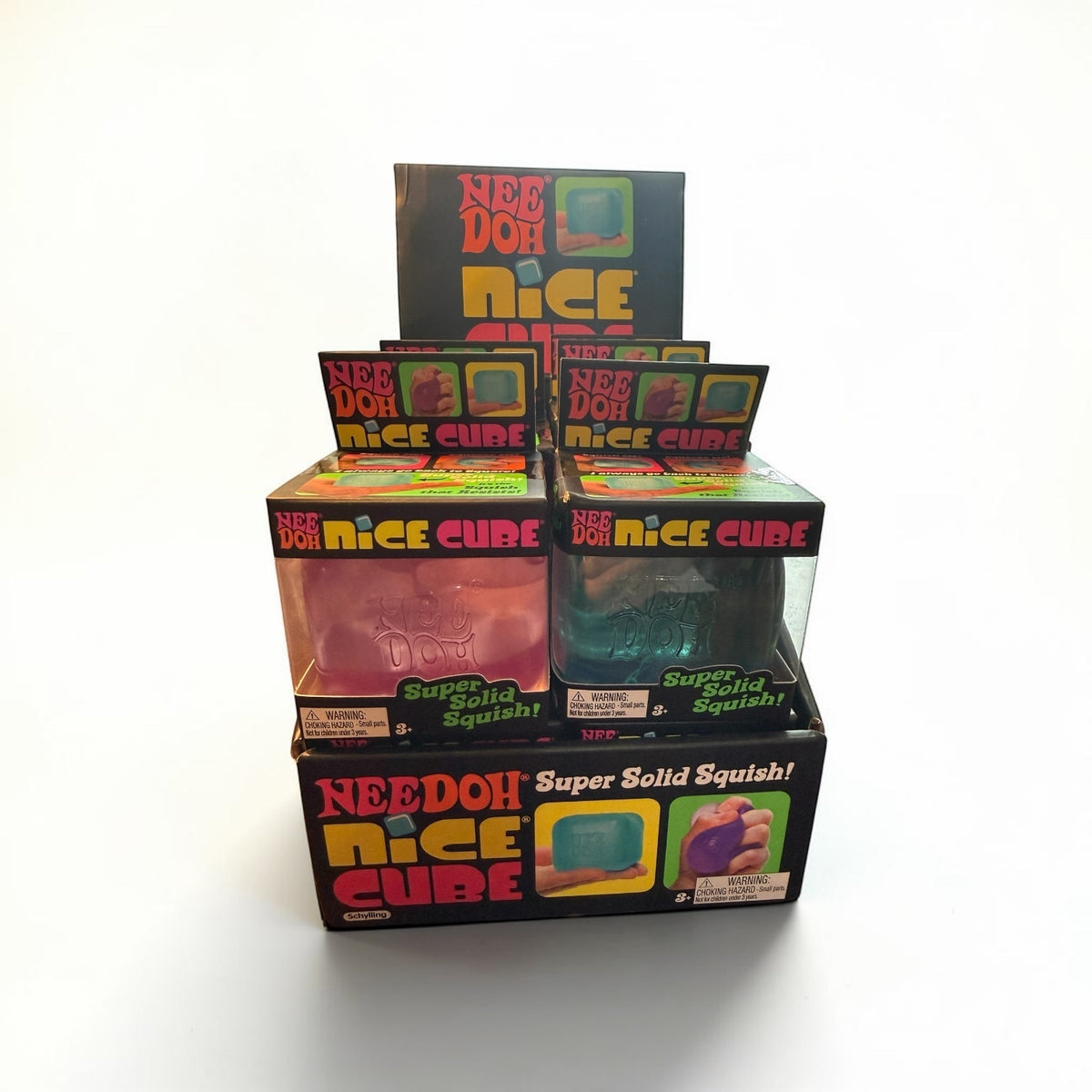 Southern Charm Collectibles NeeDoh Nice Cube sensory fidget toy display box containing multiple squishy cube toys.