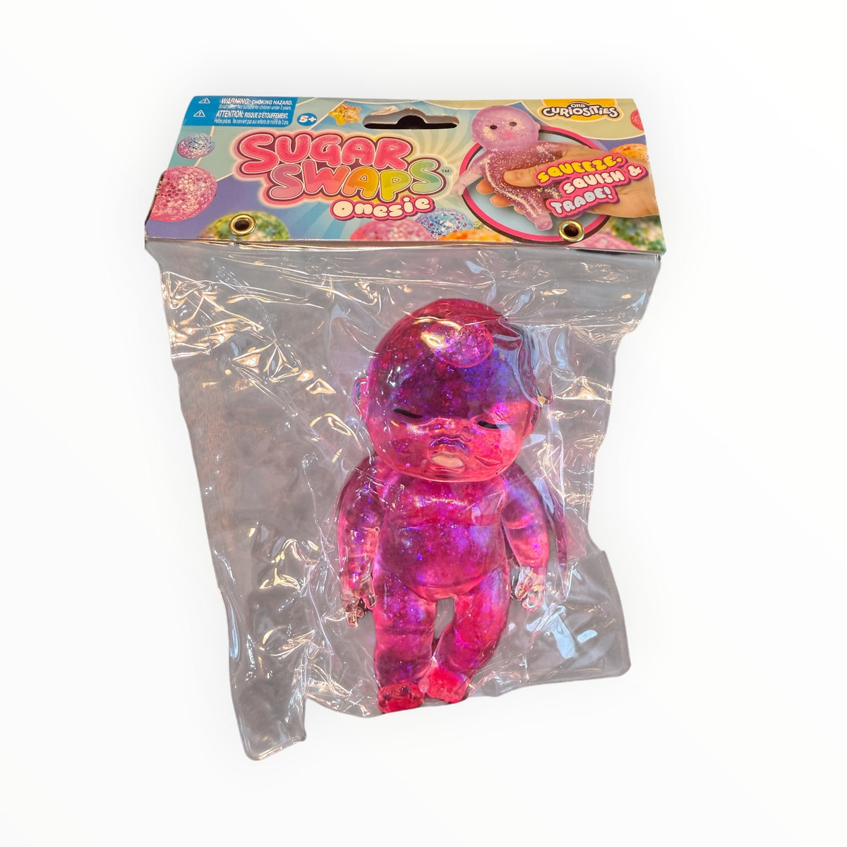 Southern Charm Collectibles Sugar Swaps pink glittery squishy baby onesie toy in original retail packaging