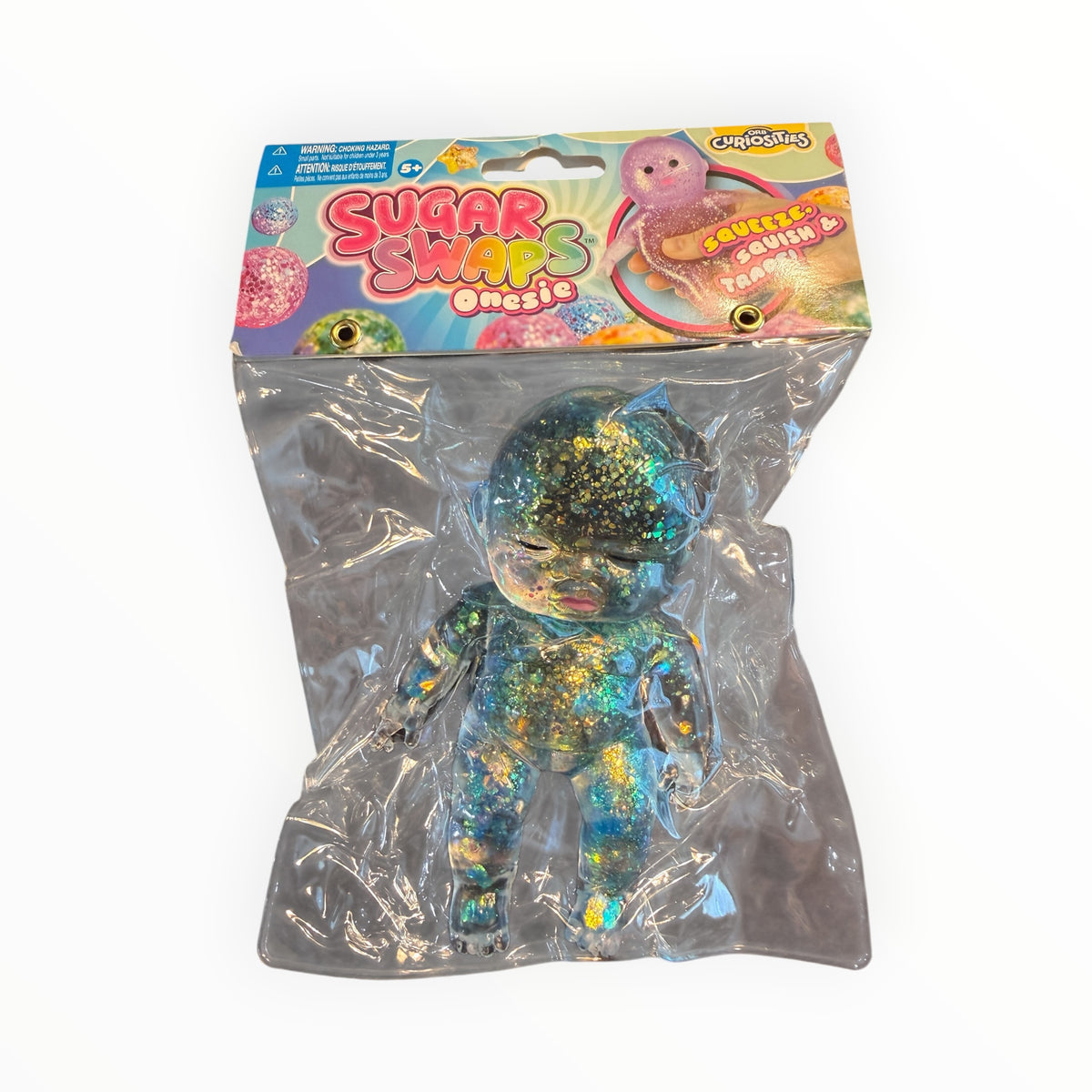 Southern Charm Collectibles Sugar Swaps Onesie glittery blue and green squishy toy figure in original packaging
